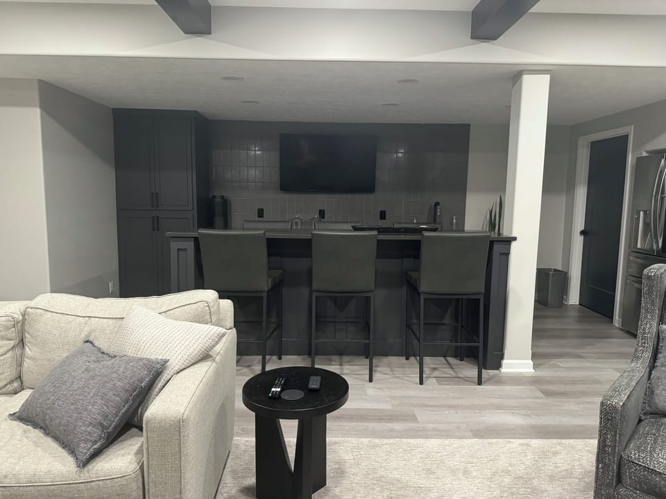 Enjoy watching sports or playing games in the bar area in the basement.