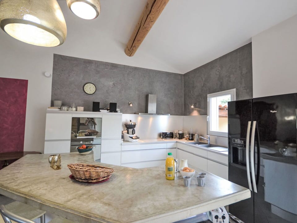 Countertop, Cabinetry, Property, Kitchen, Wood, Lighting, Sink, Kitchen Appliance, Interior Design, Kitchen Stove