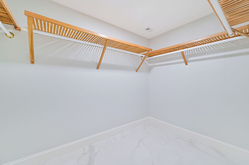 VSC1004 - The primary suite features a spacious walk-in closet