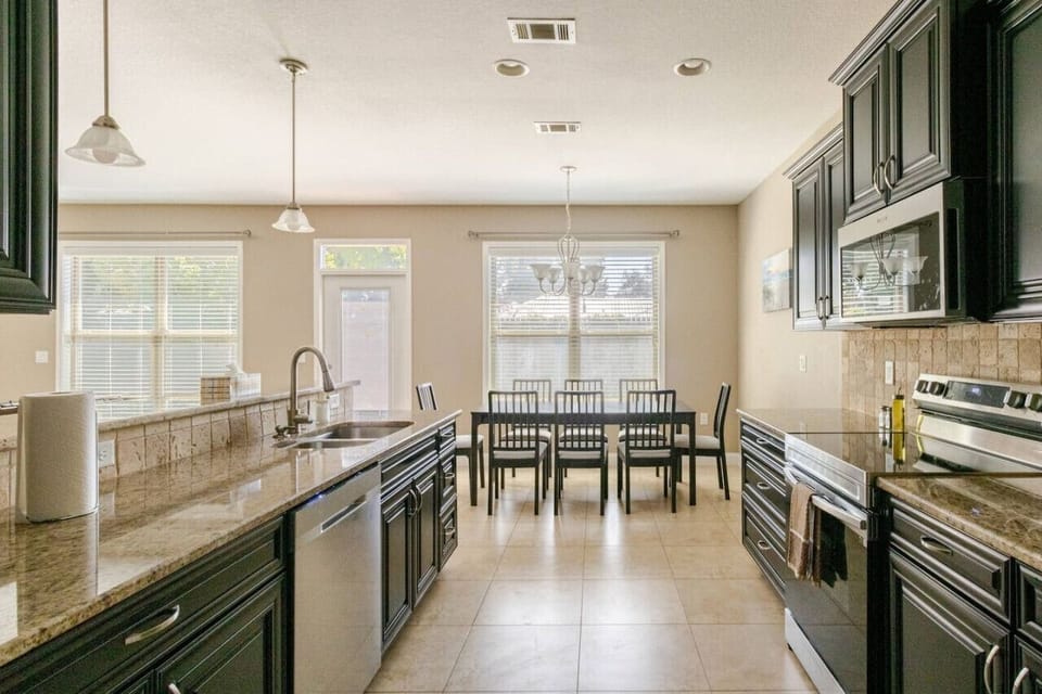 Modern stocked kitchen and dining area