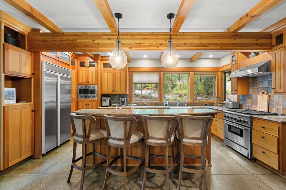 Our warm and spacious Chef's kitchen is excellent for cooking and enjoying family meals with a gas range and a breakfast bar for four. 
*Espresso maker not available for guests