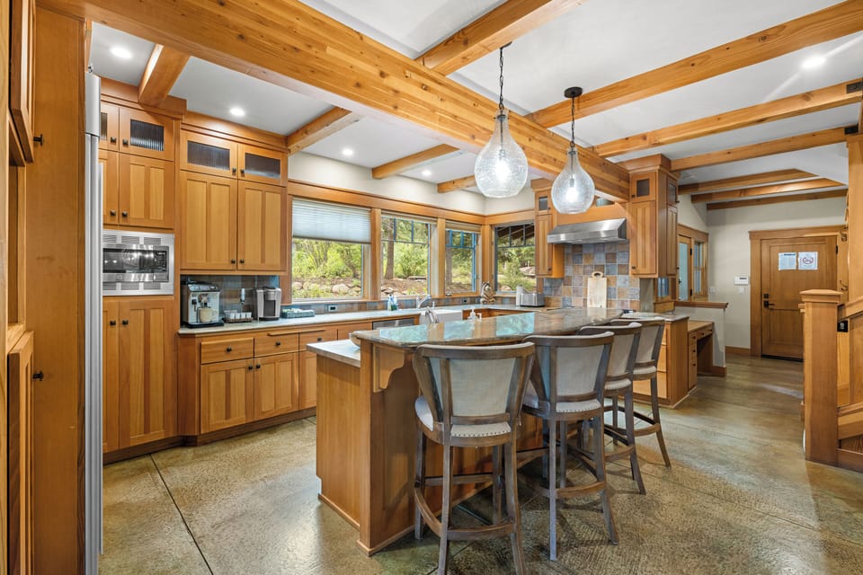 Our warm and spacious Chef's kitchen is excellent for cooking and enjoying family meals with a gas range and a breakfast bar for four. 
*Espresso maker not available for guests