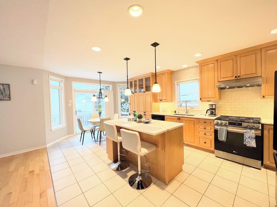 Large kitchen with a beautiful view and all the necessary utensils for cooking