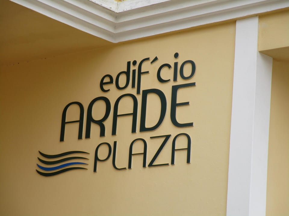 The name of the building seen near the entrance to the communal area, garden and pool.



