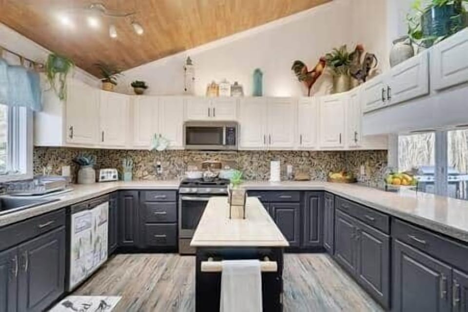 The kitchen's functional design, with ample counter space and storage.