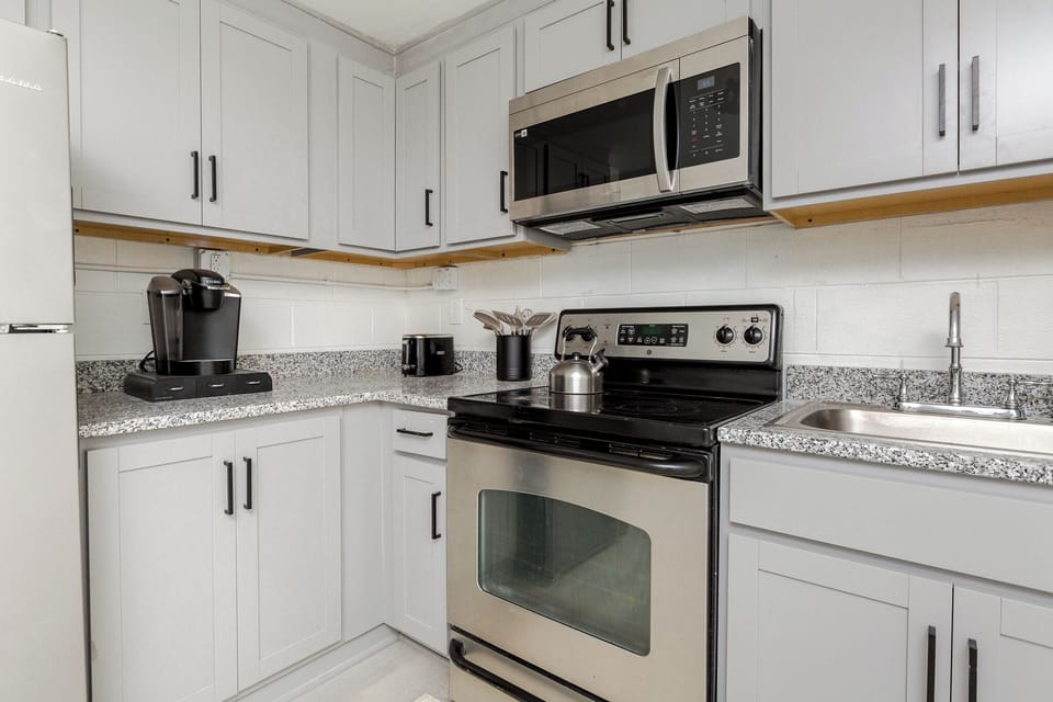 Full kitchen with Keurig, kitchenware, utensils, pots & pans etc.