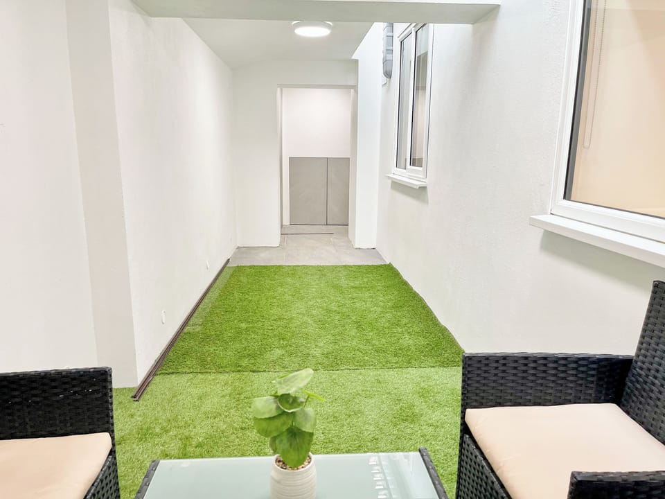 Private patio with seating near Shoreditch, Boxpark & Columbia Road Market.