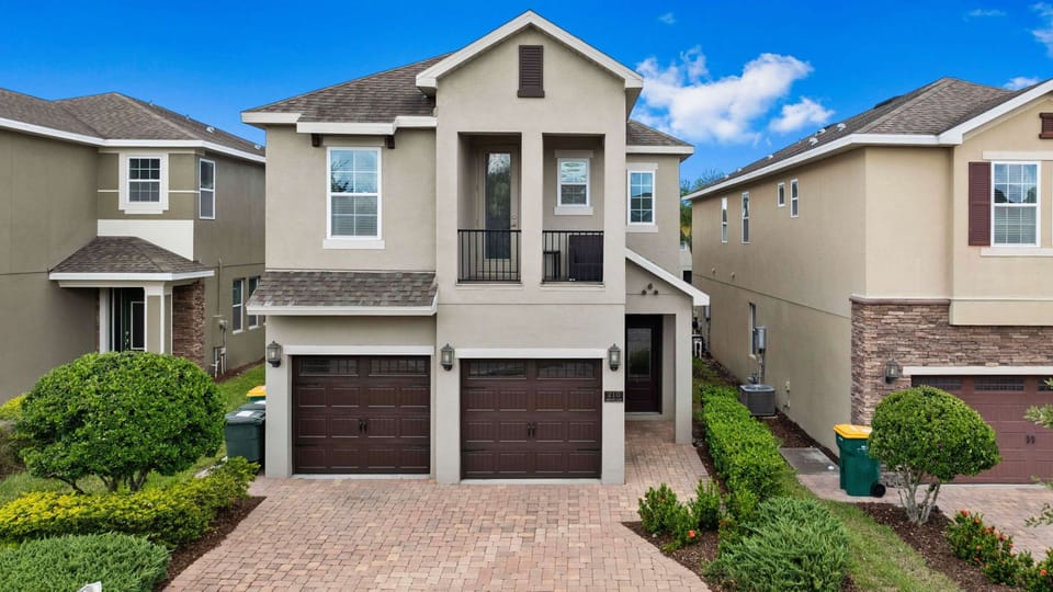 Gorgeous two story home with front balcony.