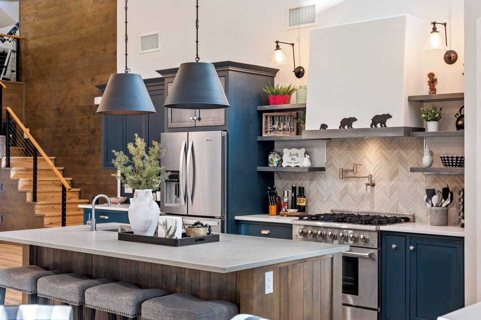 Island has space for cooking, serving, eating. 2nd sink for added convenience.