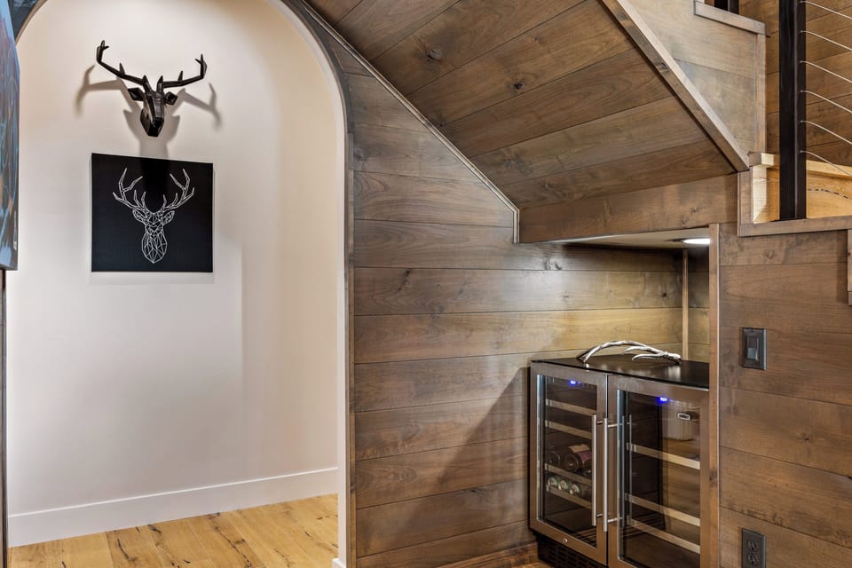 Guest have access to one side of wine/beverage refrigerator!
