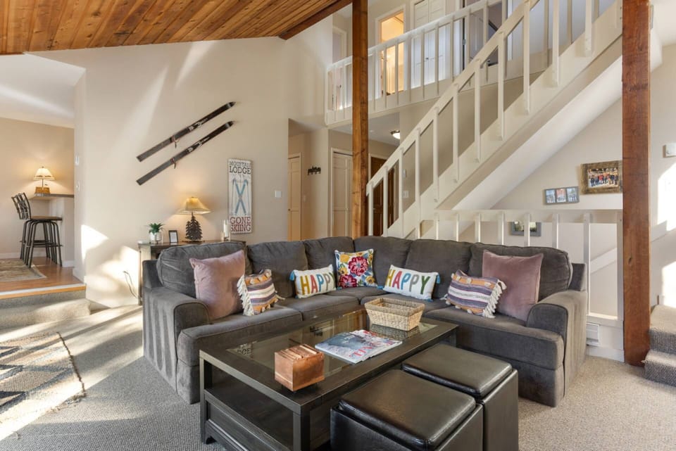 Sink into comfort on the plush sectional in the living room.