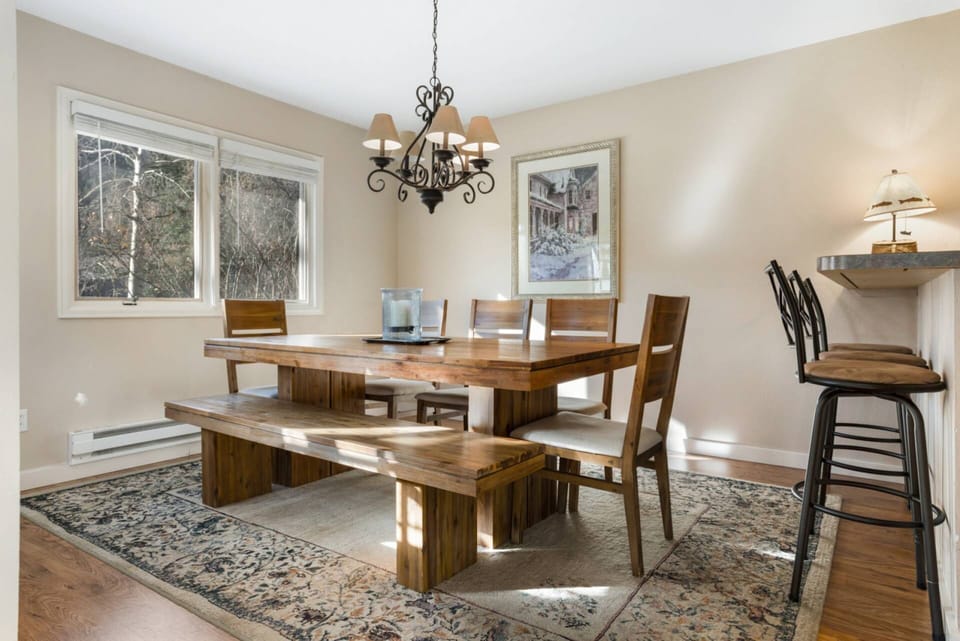 Gather around the spacious dining table, comfortably seating 8, for memorable meals and lively conversations.