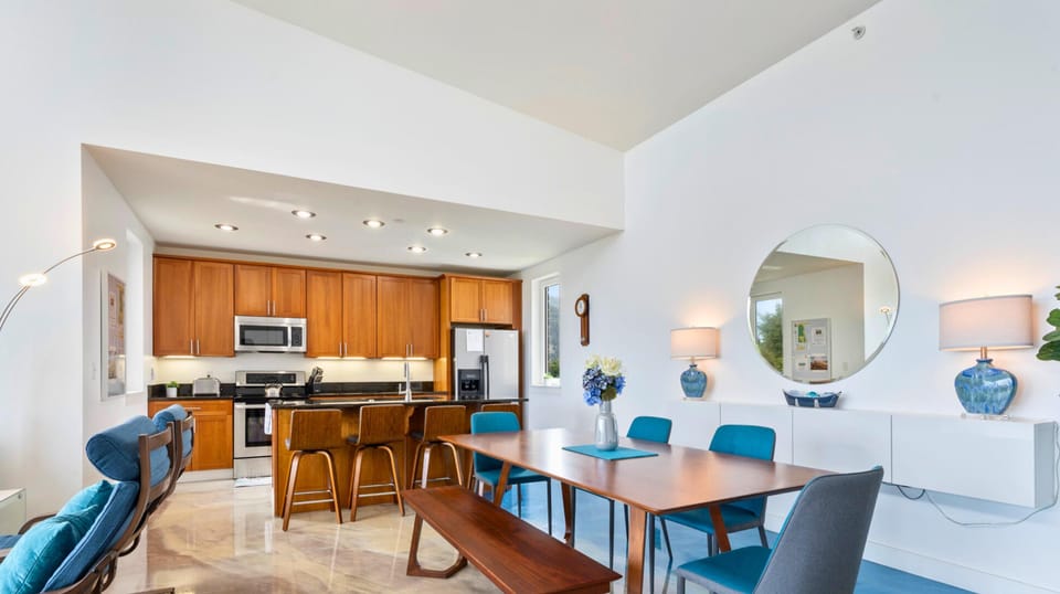 Our dining area, with its warm wood tones and inviting blues