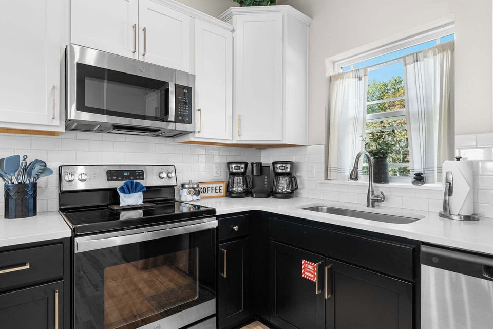 The kitchen is stocked with all necessary cooking utensils and appliances, ready for you to cook up your favs!