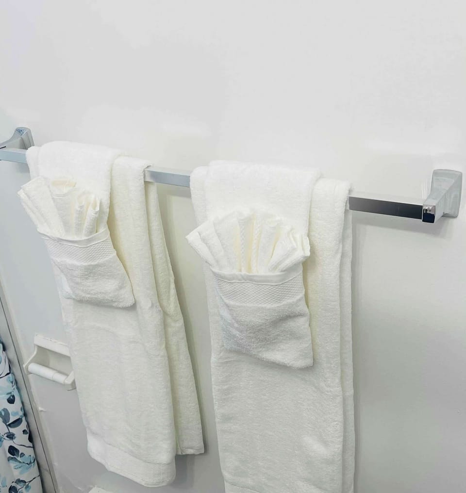 Fresh towels in the bathroom are provided