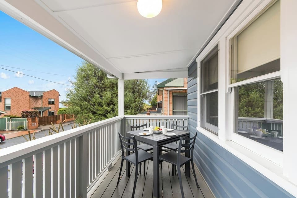 Enjoy outdoor meals or after-dinner drinks on the balcony fitted with a four-seater table. 