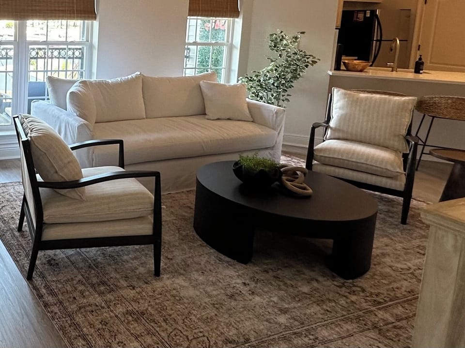 White queen pull out sofa. All furniture is in new condition. 
