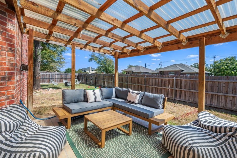 Roofed patio with plush seats