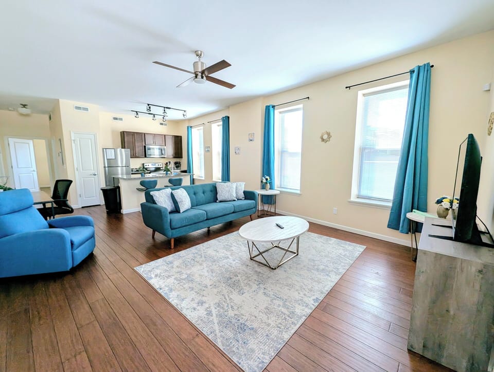 The cozy living room is designed for relaxation and entertainment.
