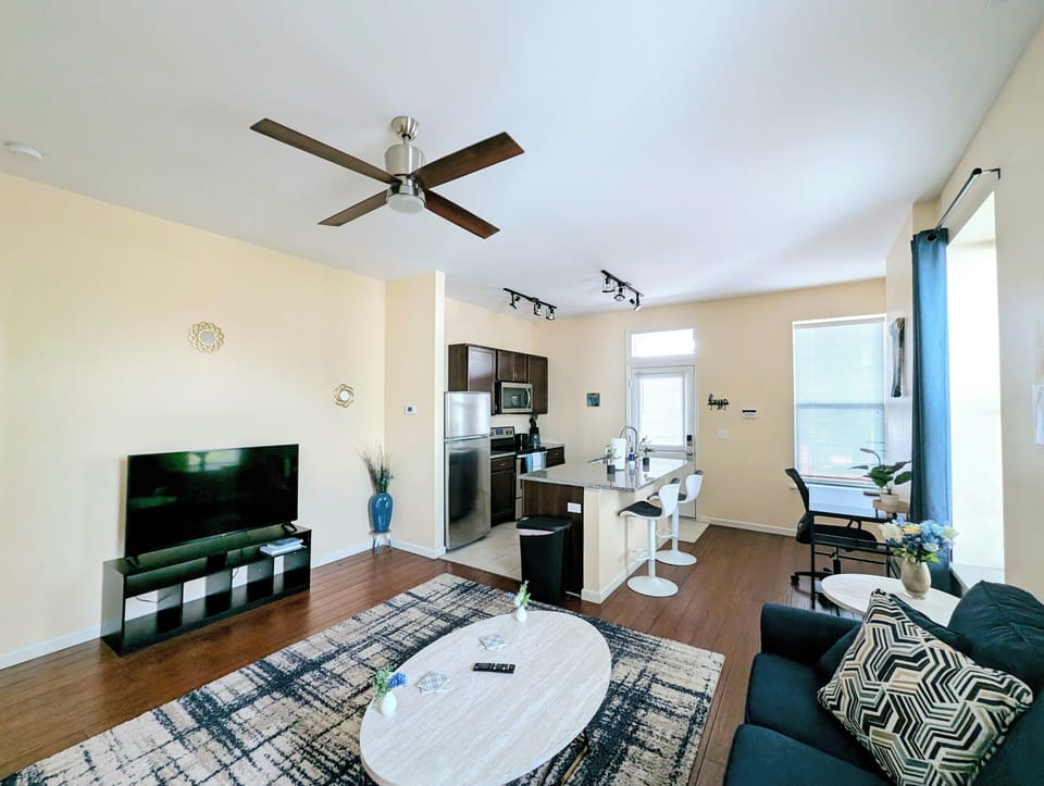 A beautiful and cozy living room while watching your favorite TV show or movie!