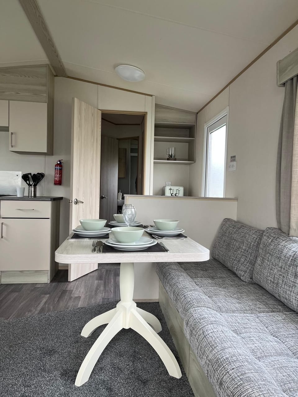 The open-plan layout ensures there is plenty of room for everyone to unwind comfortably, even after an exciting trip to the nearby dog-friendly beach.