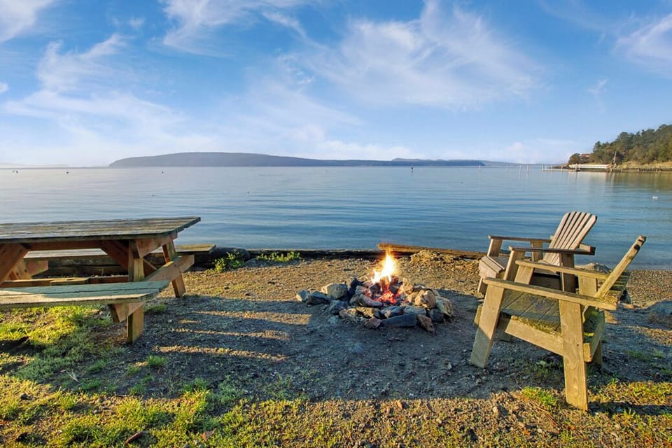 Picnic table and firepit on epic beach