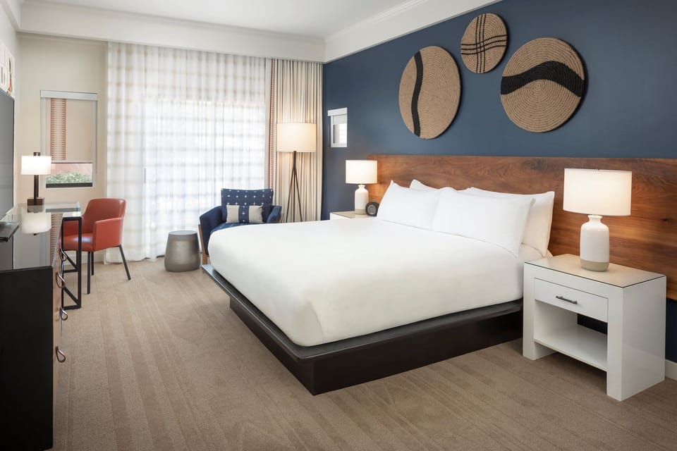 Unwind in crisp linens and a serene, sunlit retreat.