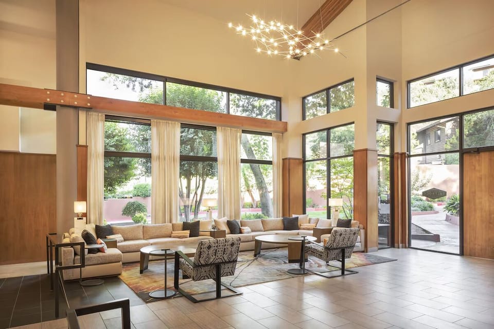 Unwind in the airy lobby lounge under sparkling modern lights.