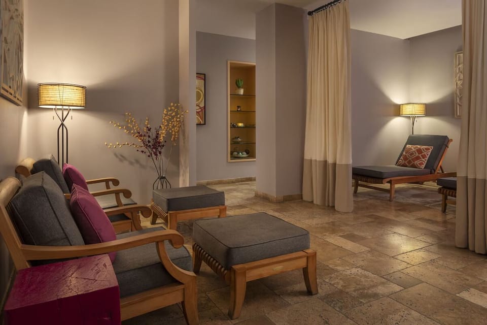 Recharge in a cozy lounge with warm, soothing lighting.