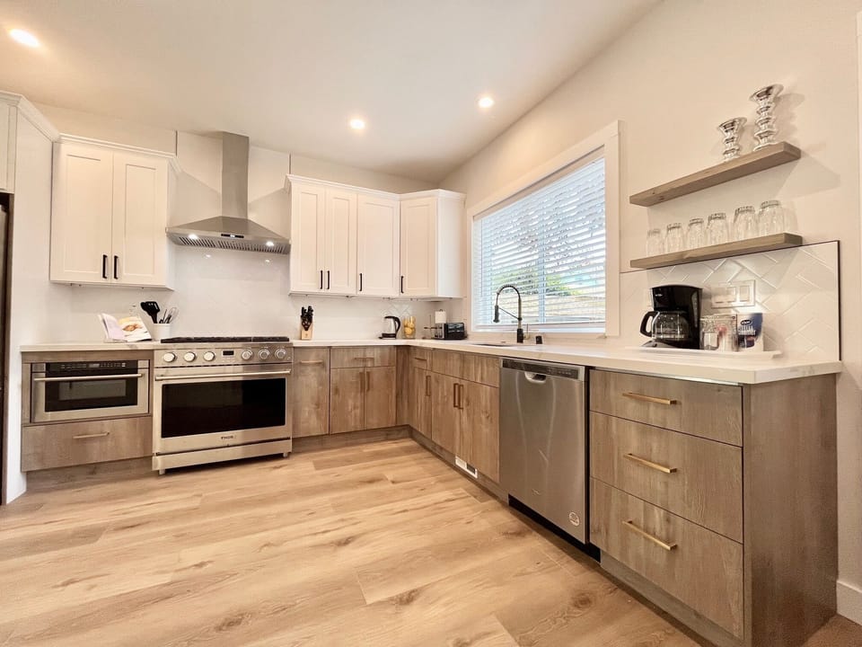 Cookware, utensils, coffee maker, toaster, and kettle for your use.