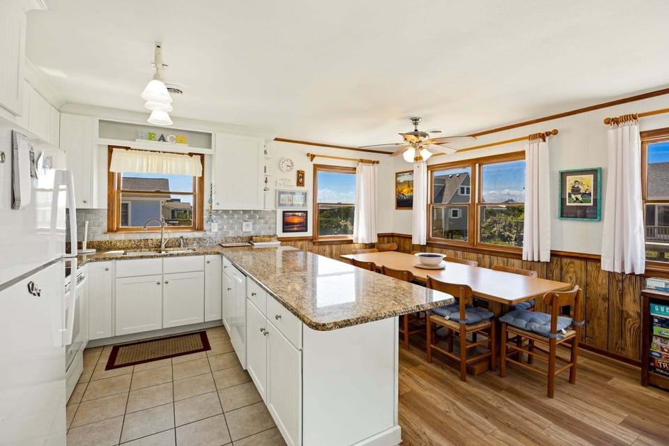 The well-equipped Kitchen features modern appliances and ample counter space, making meal preparation a breeze.