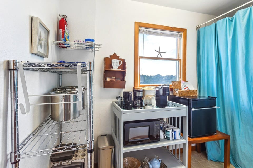 The fully equipped Kitchen offers everything you need to prepare delicious meals with 9' of counter space next to the refrigerator with an ice maker.