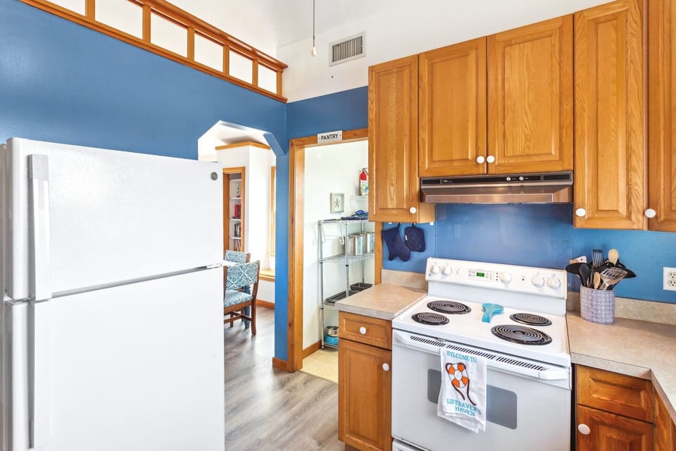 The fully equipped Kitchen offers everything you need to prepare delicious meals with 9' of counter space next to the refrigerator with an ice maker.