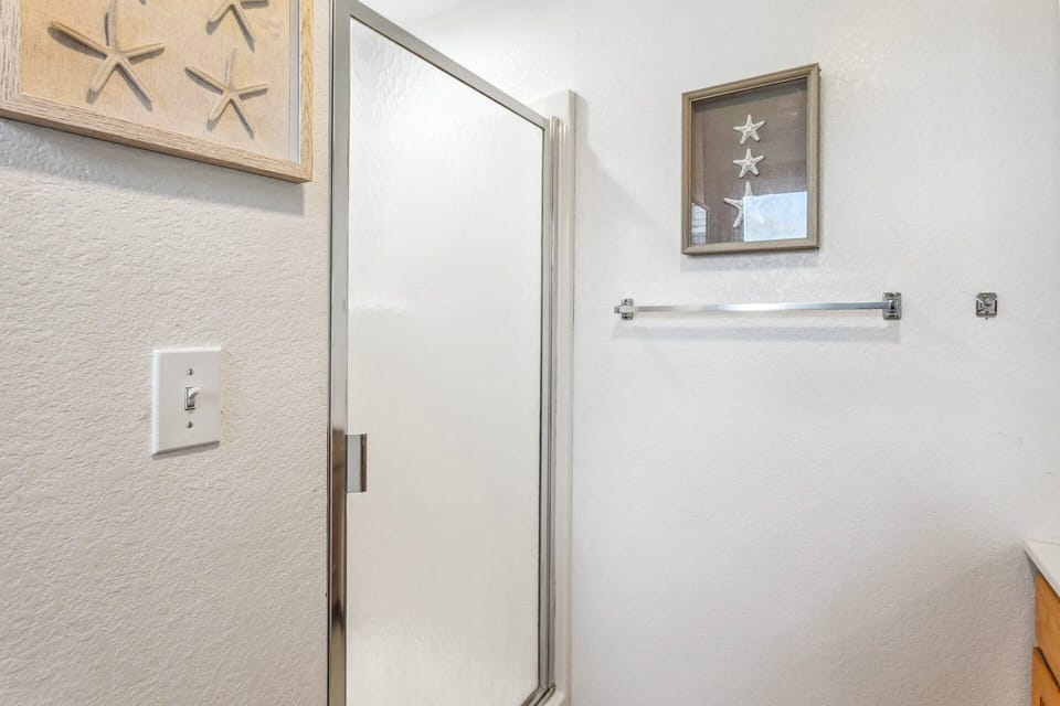 The Full Master Bathroom with a shower makes freshening up easy.