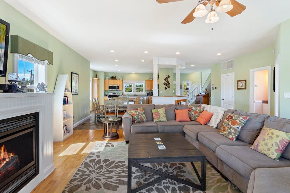Start your vacation in quiet seaside luxury with a spacious Living Area that boasts a large, Flat Screen TV and plenty of cozy furniture.
