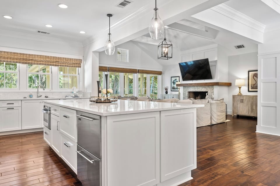 Large kitchen view into living room