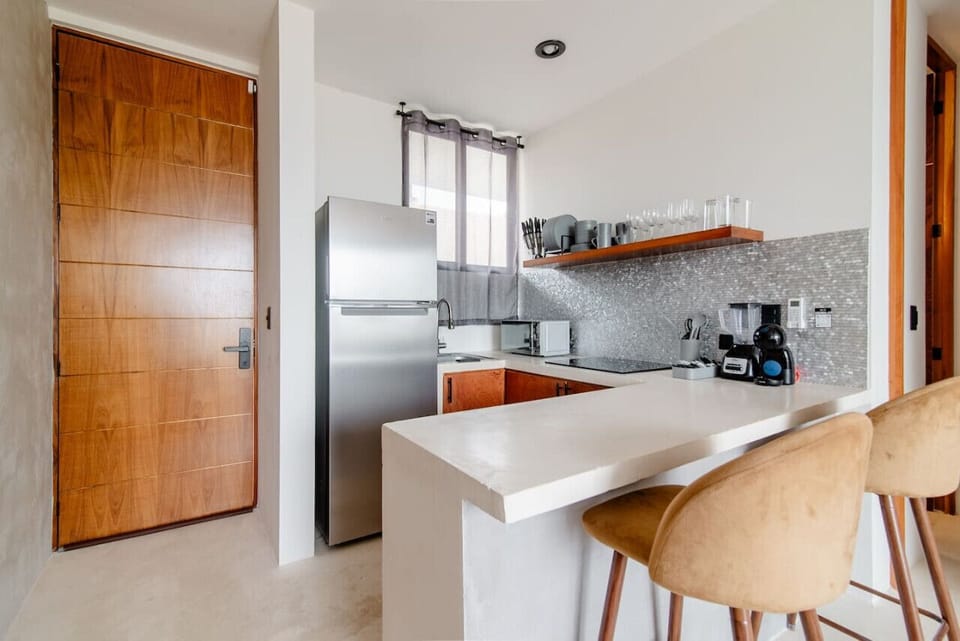 Kitchen: Sleek design meets functionality—whip up your favorite meals in style!