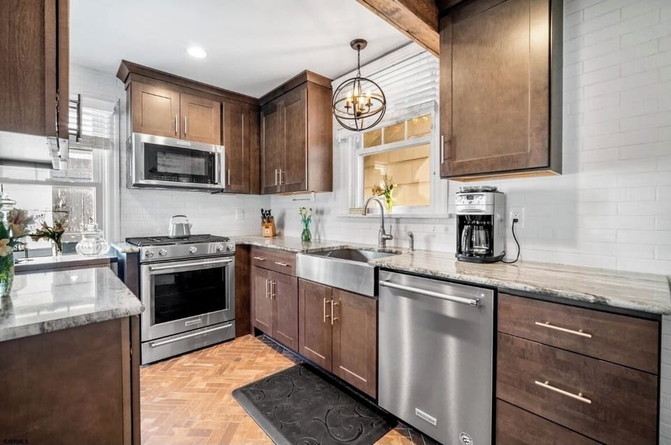 Fully stocked kitchen: crockpot, Keurig, coffee pot, waffle iron, toaster & more