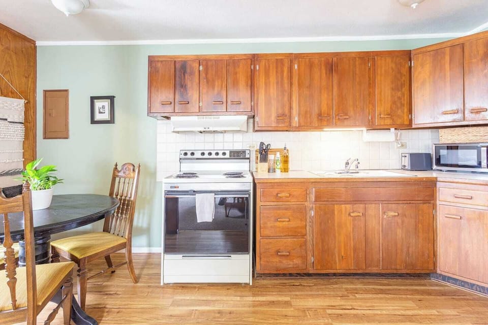 The kitchen is compact but adequately stocked with all the essential tools needed for prepping simple meals - stainless pots and pans, mixing bowls, baking dishes, utensils etc.- plus coffee, tea, and a selection of pantry items. 