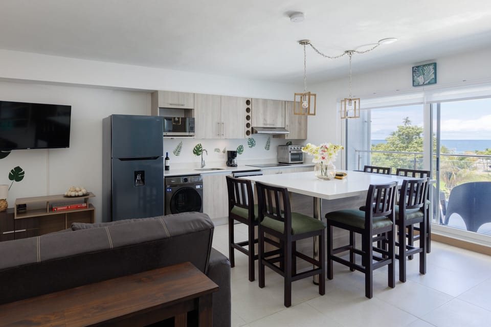 Nature meets the sea—enjoy lush green interiors and stunning ocean views just steps away.