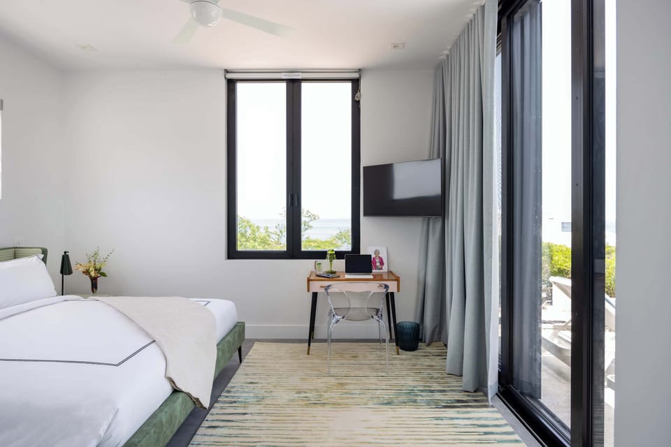 Master Bedroom 1 -Elegantly furnished with curated pieces from the Roche Bobois collection”