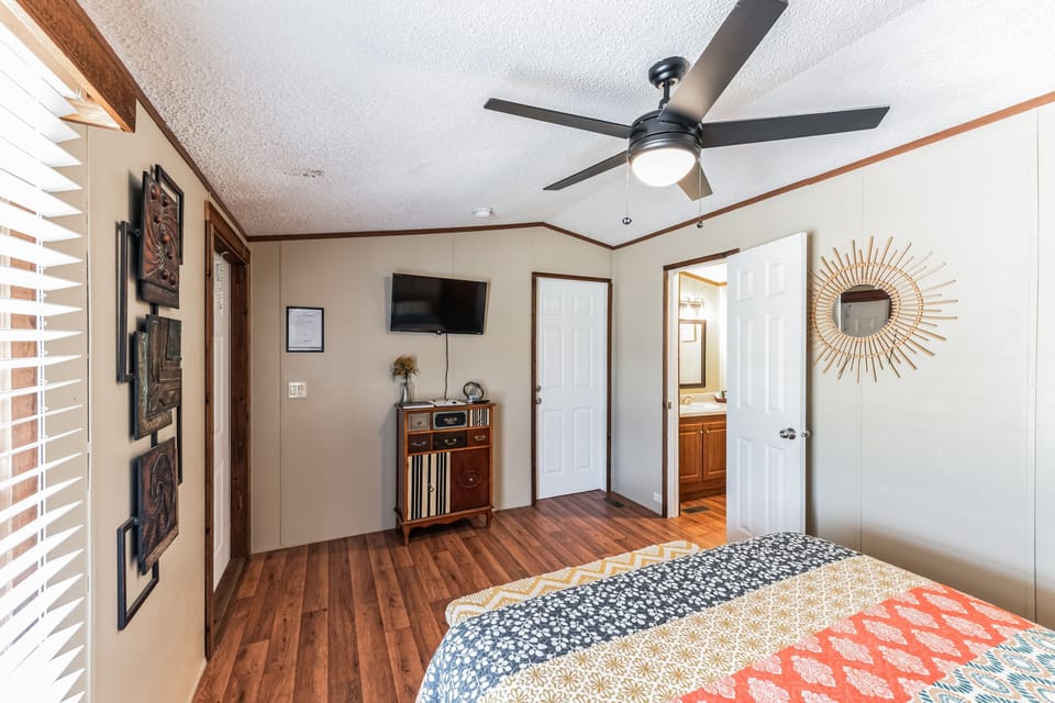 Indoors, Ceiling Fan, Screen, Bed, Furniture