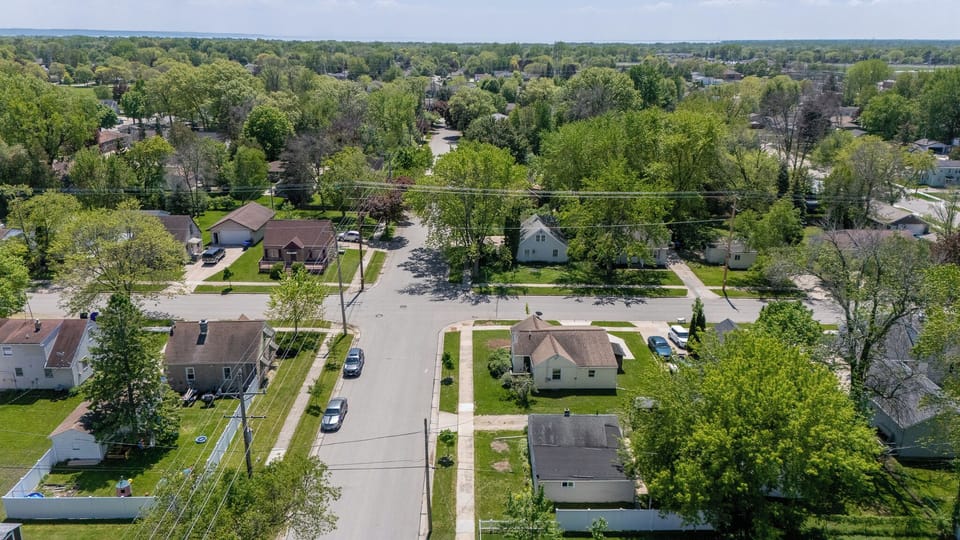 - Neighborhood overview with tree lined roads and sunny community setting   - Convenient layout offers easy access for exploring nearby hotspots   - Great fit for travelers seeking comfort calm and simple navigation