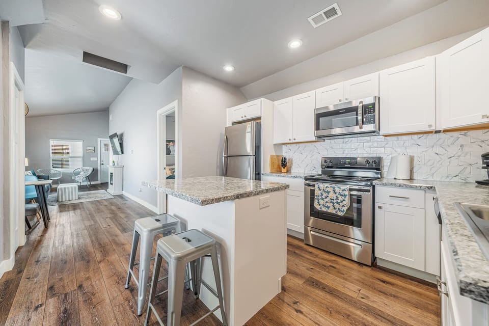 View from kitchen into other living areas
