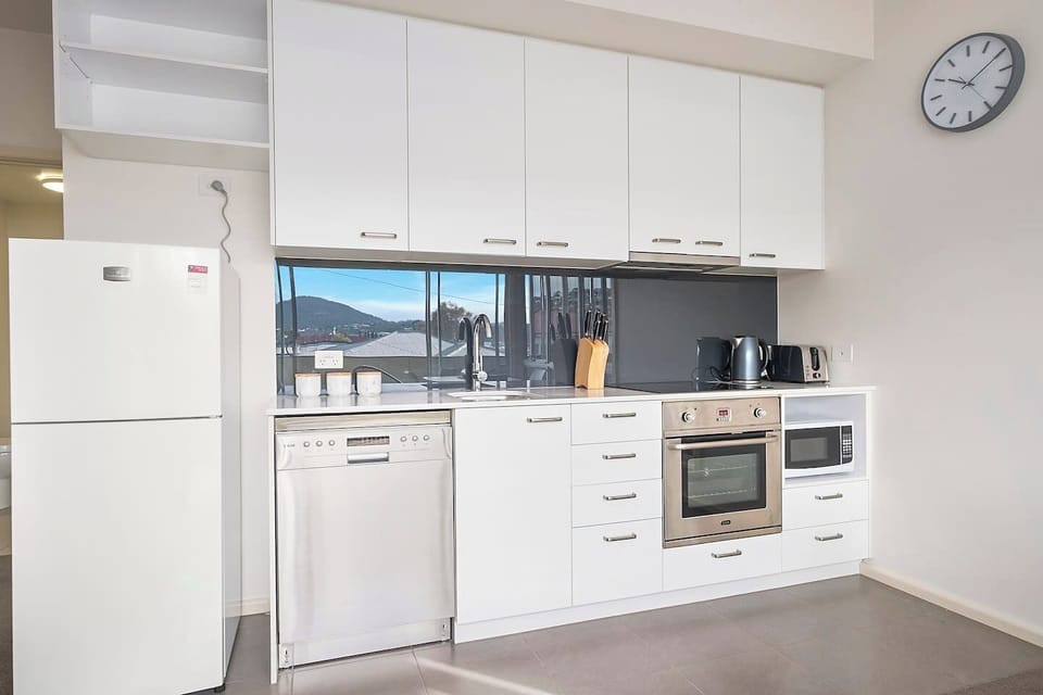 When you can't be bothered sampling the many restaurants nearby, a fully-equipped kitchen makes it easy to whip up meals at home. 