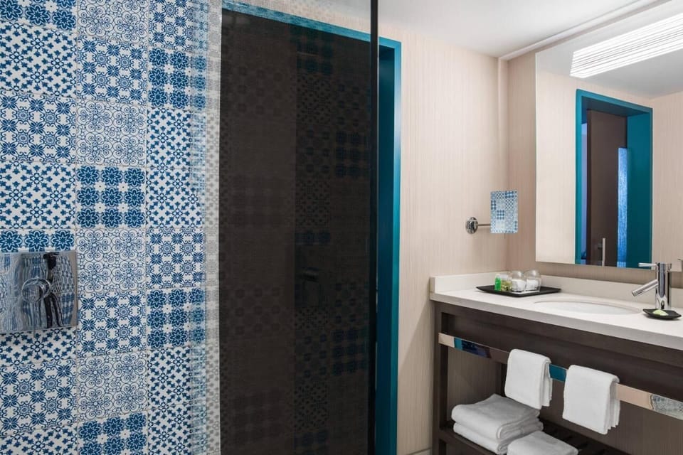 Enjoy a spotless vanity setup for easy, unhurried mornings.