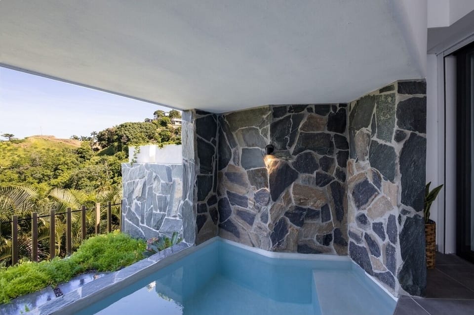 Your pool overlooks the mountain, ocean and your garden. 