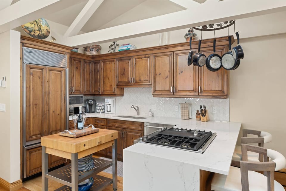 The gourmet kitchen is perfect for cooking meals together.  Grab a glass of wine and have a seat at the breakfast bar to chat up the cook!