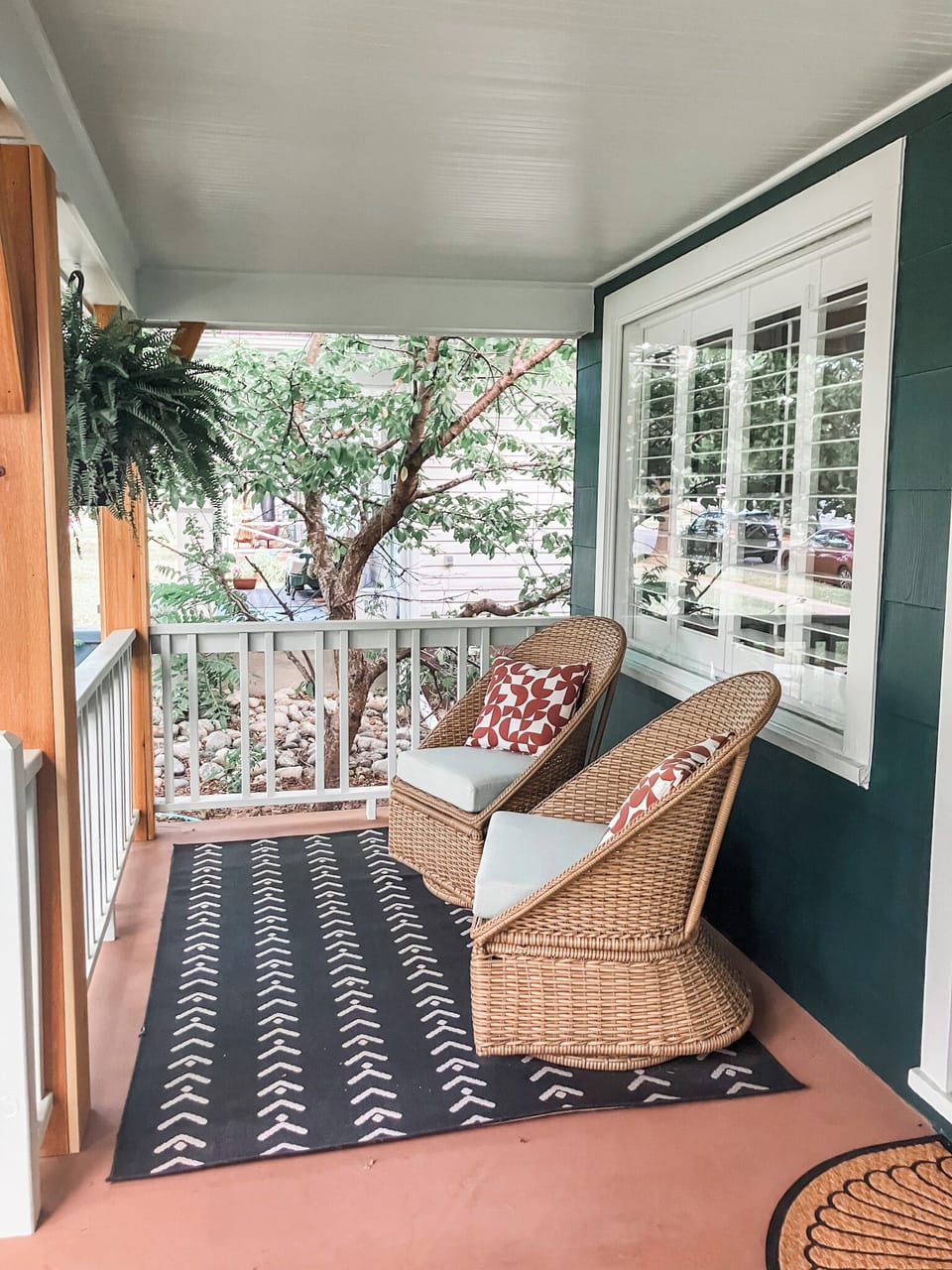 Swivel and rocking chairs on front porch