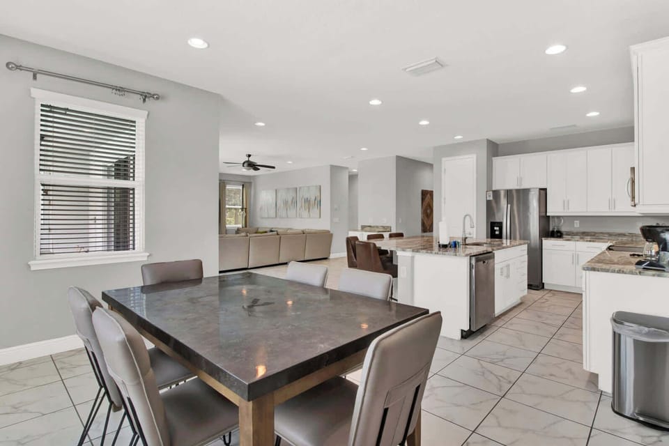 Experience seamless flow with our open floor concept, connecting the living room, kitchen, and dining area.